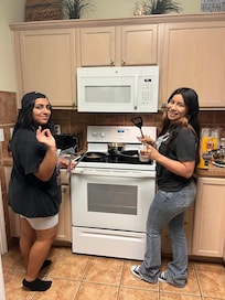 Our girls adulting making breakfast for their parents and siblings and Tio.
