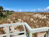 View from end of walkway toward beach. Does not connect to beach.