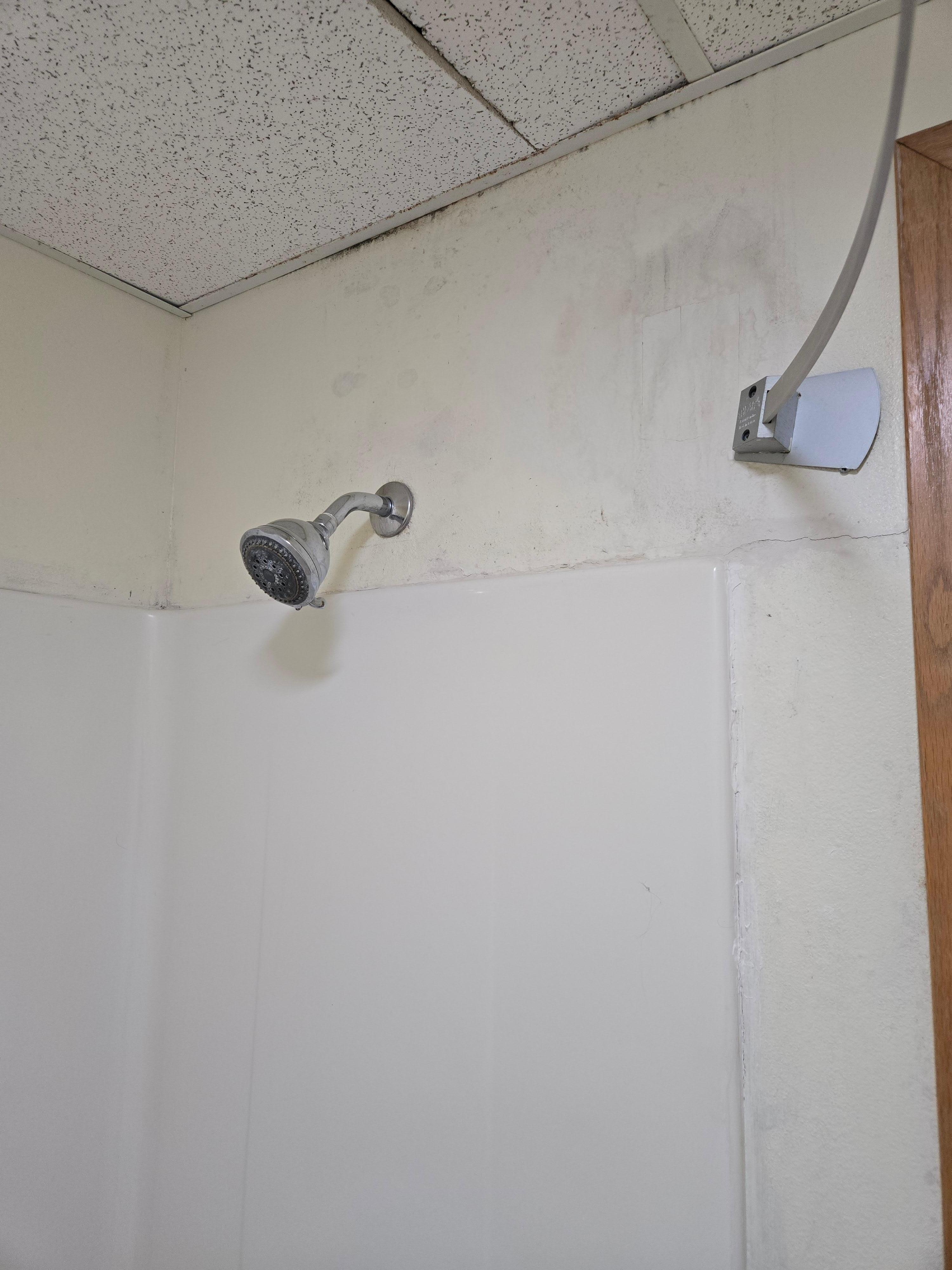 Walls patched and not painted. Ceiling tile broken in bathroom. 