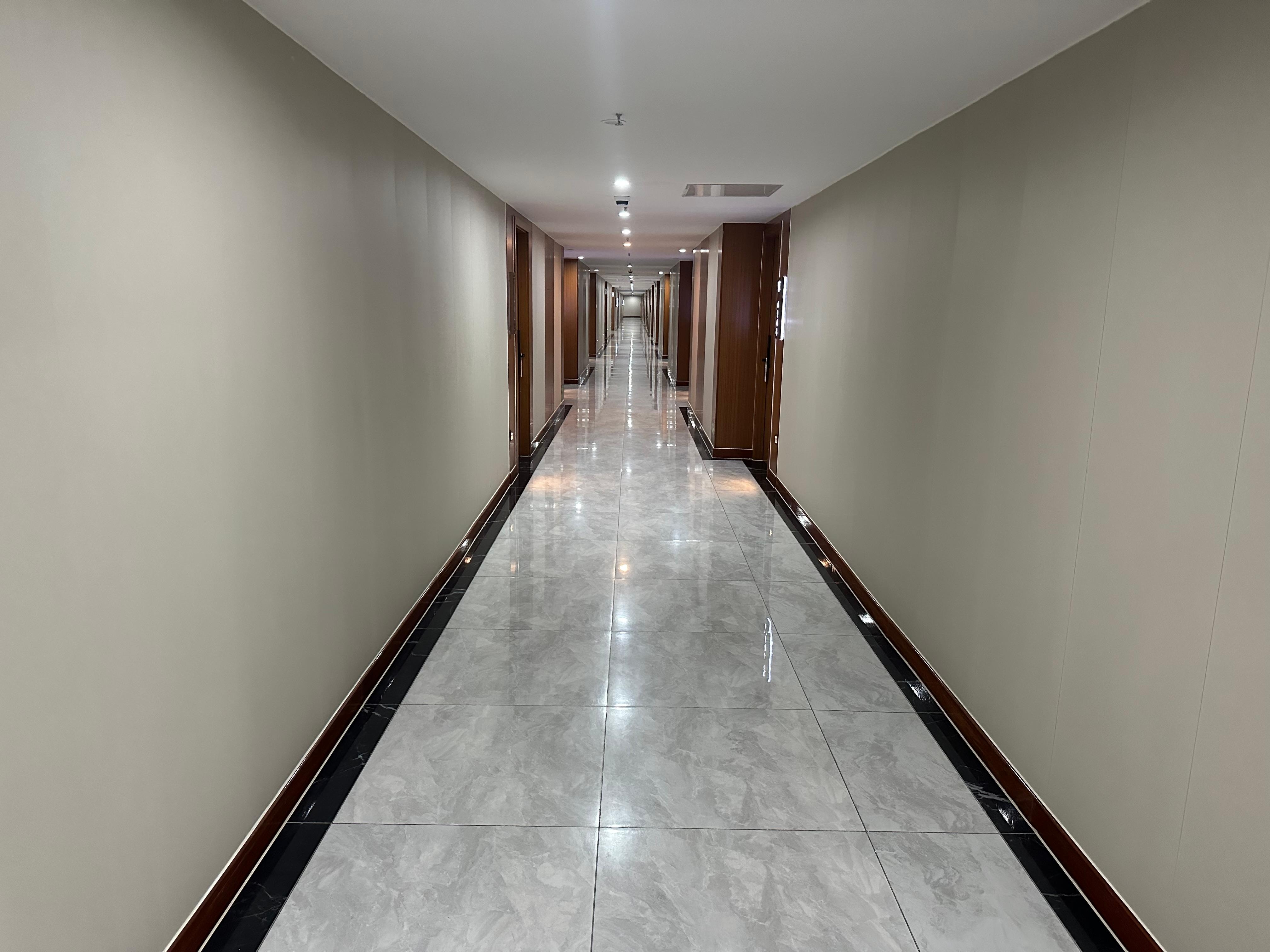 Hallway. Cold like a hospital.  