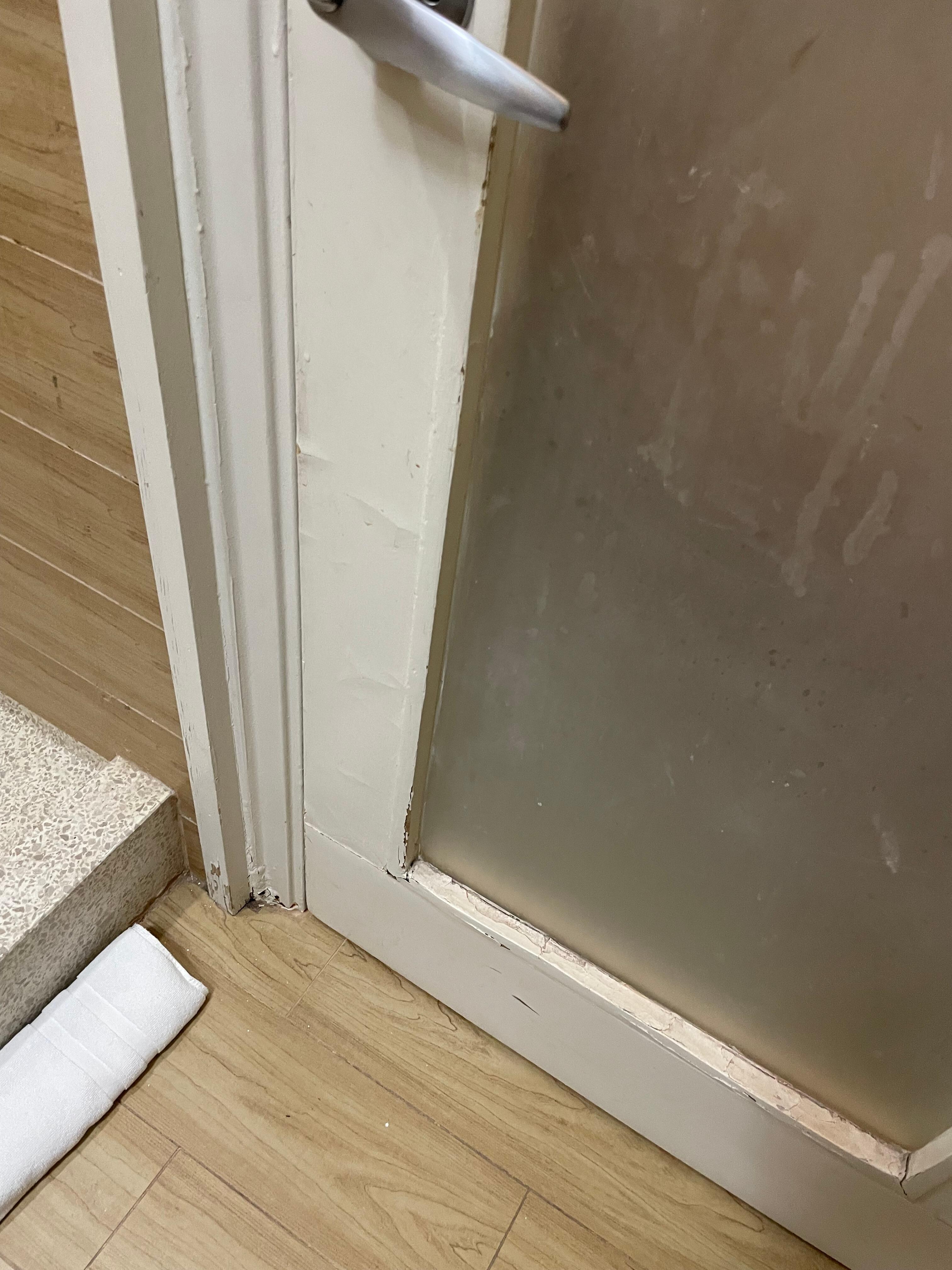 Bubbling/chipped paint on bathroom door