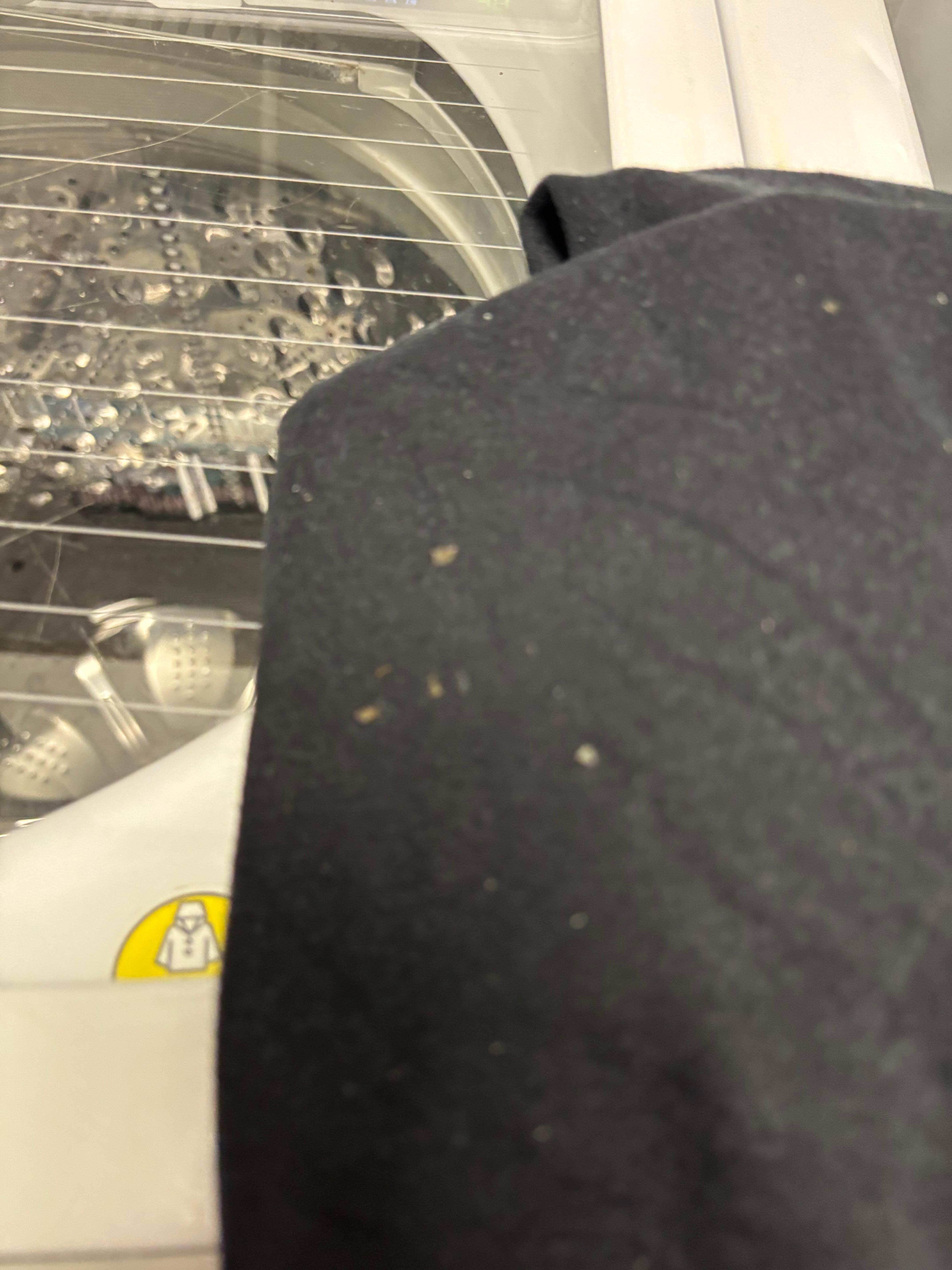 Sludge on clothes after using washer 