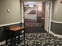 Cute game room/library spot on second floor. Super cute and fun!