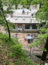 Standing above the cave looking down on patio