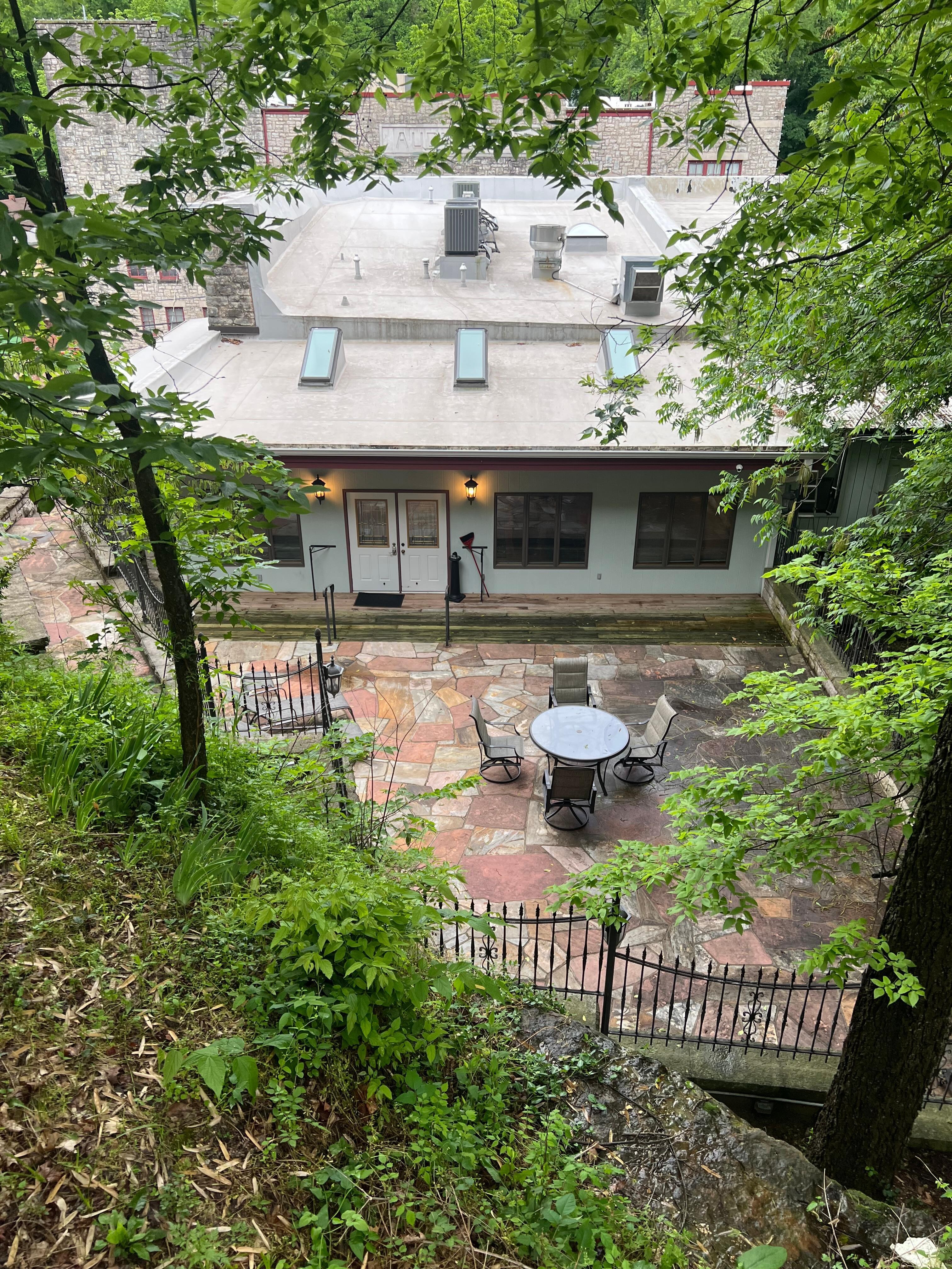 Standing above the cave looking down on patio