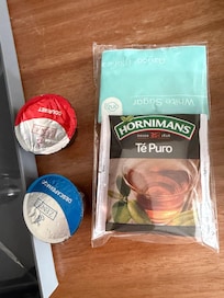 This is only coffee pods for 4 people ! And 1 bottle of water for 4 people !