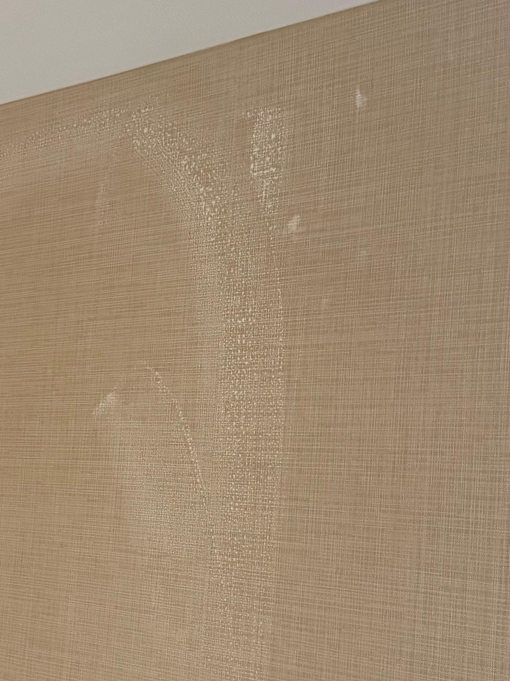 Wall stains in the room.