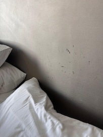 Headboard scratched up and tearing