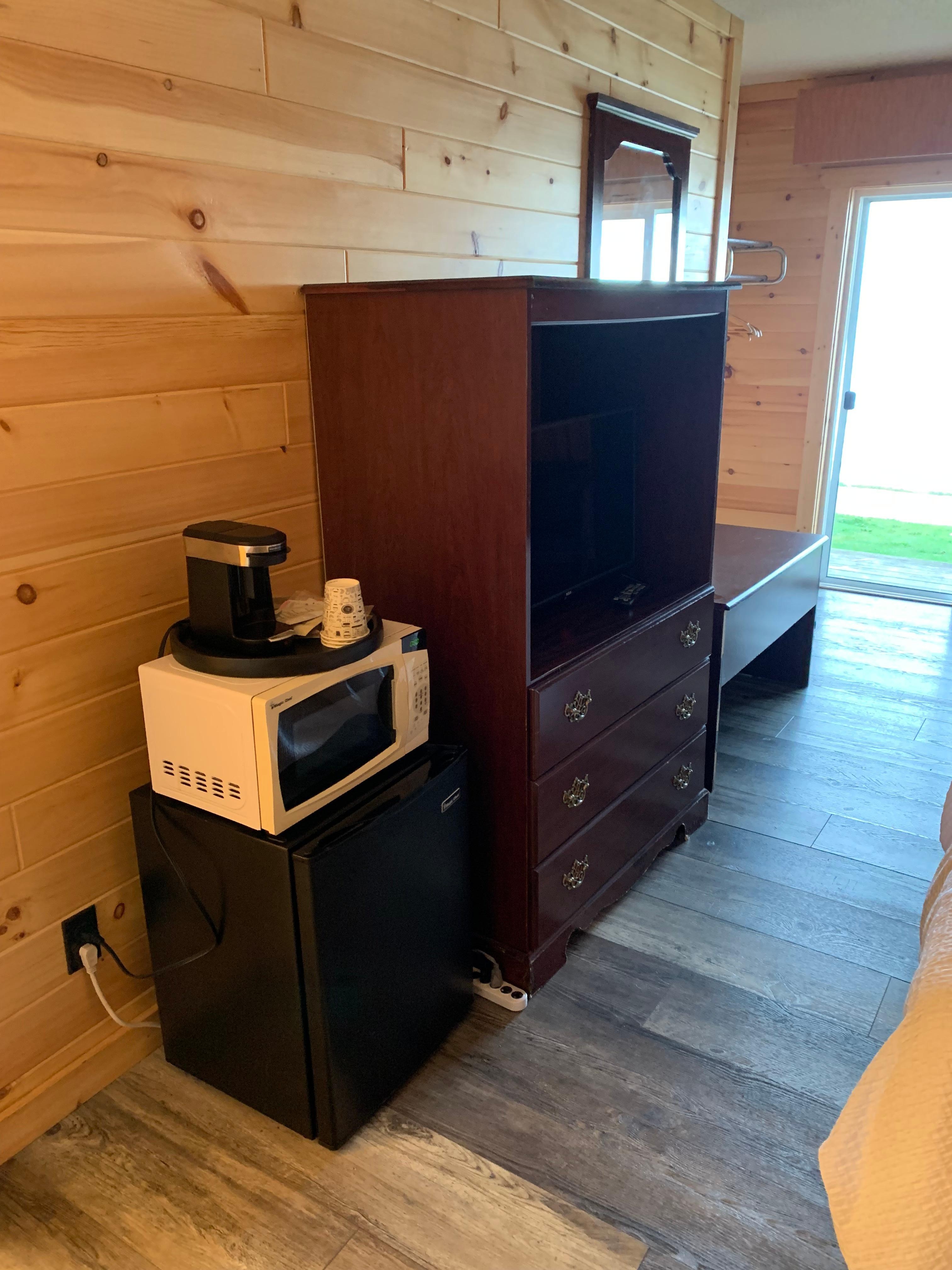 Something simple and more modern would help improve the new renovation.  Though functional