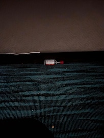 Nip bottle under bed
