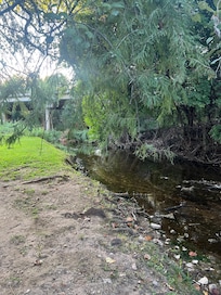Barons Creek which borders the hotel grounds.  Hard to believe that you are only a block from Main Street.