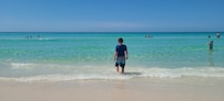 Short walk to the white sandy beach