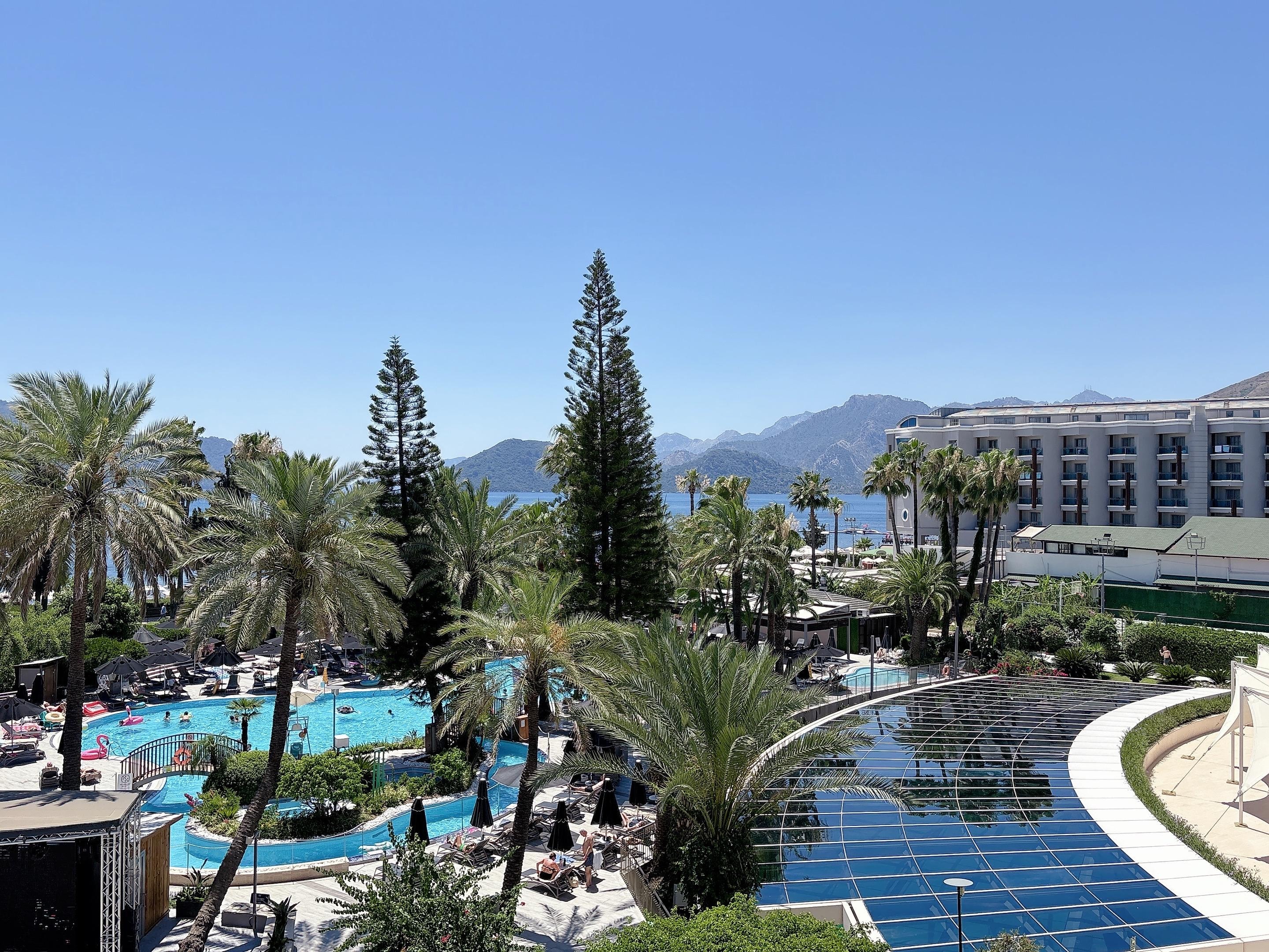 View of the pools and beach from our balcony