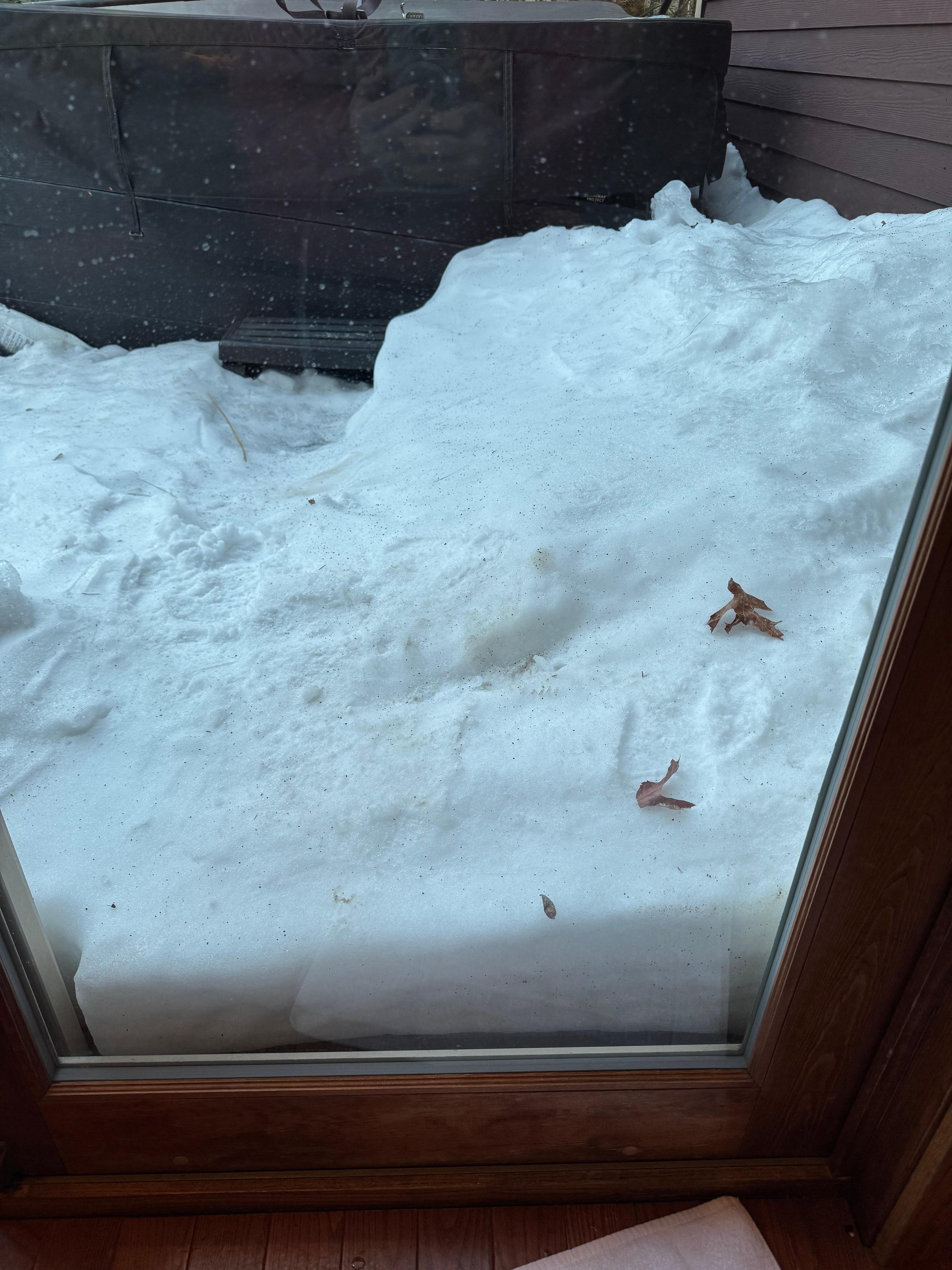 This is what our hot tub looked like of our arrival. Could not even get access to it because of solid ice on the deck, and the side pieces were falling off of it.