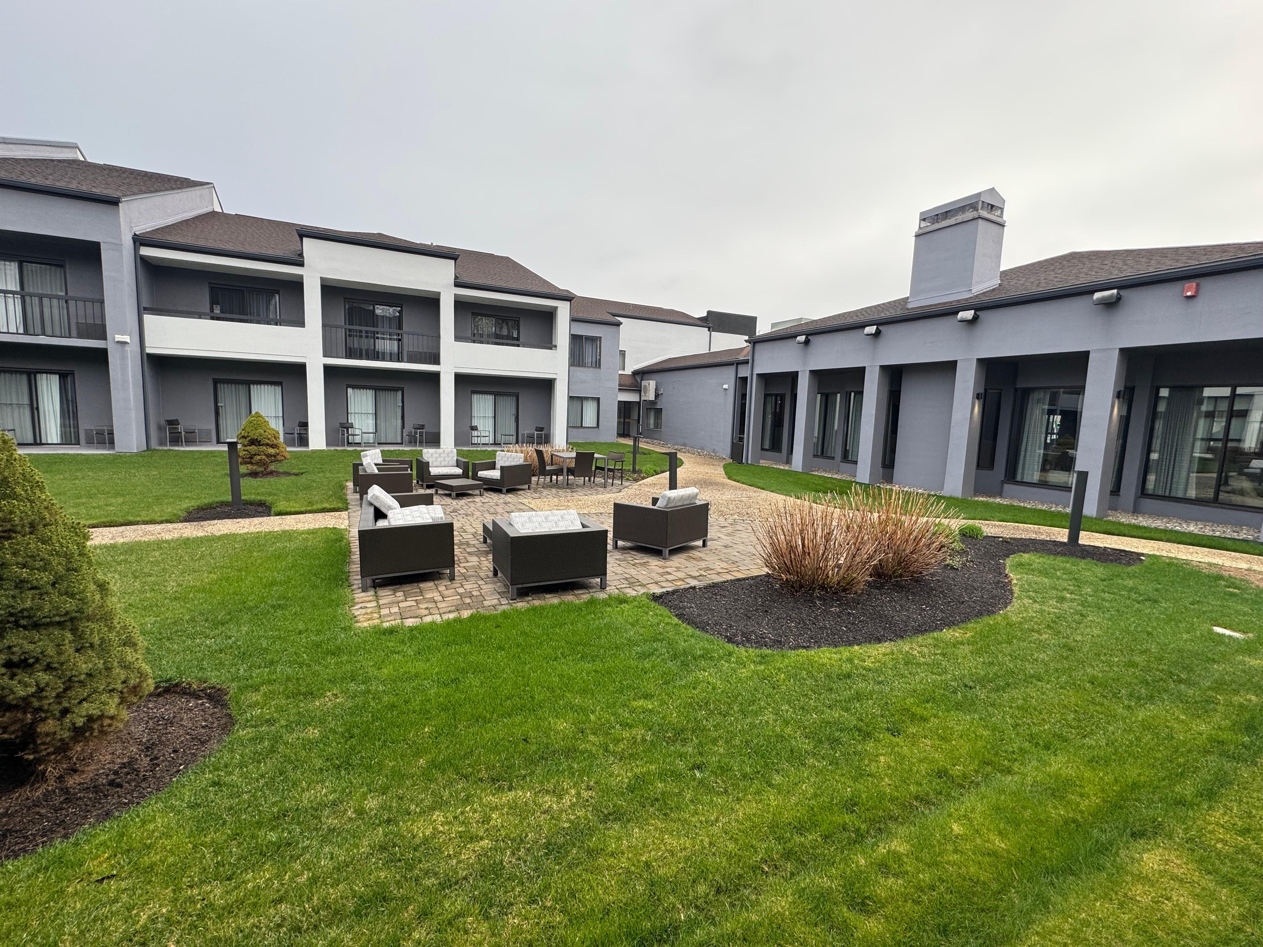 Outside the room is a meeting area 
