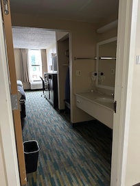 A room next to us the sink is open to the room not private if that’s a concern Comfort Inn is across street