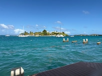 Island on the cay, the nearest white sand beach. Take the water taxi over.