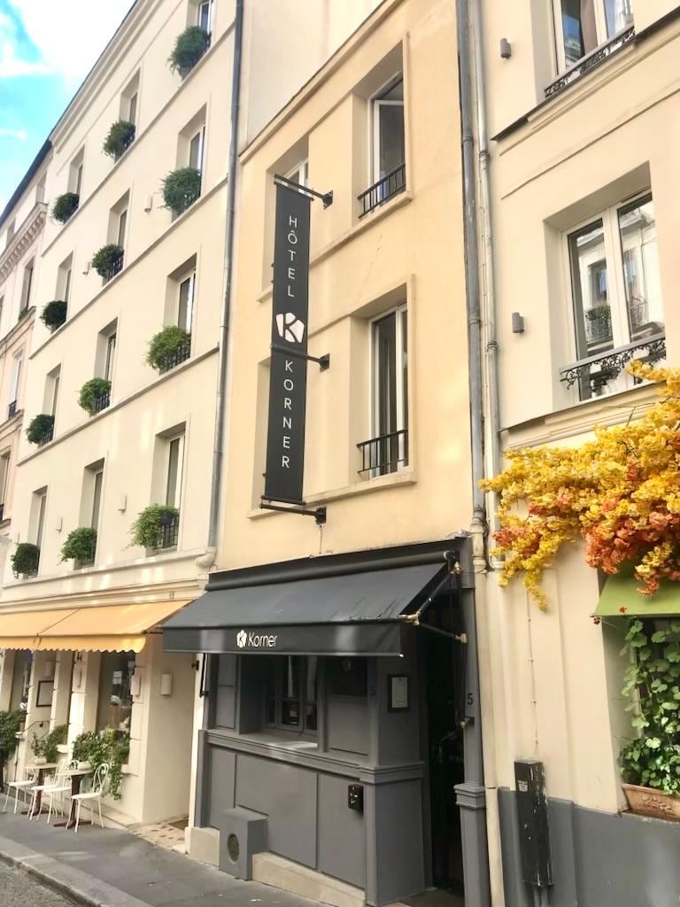 Front of hotel. On side street off main busy streets. Opposite an Italian restaurant that had a fabulous piano player in the evening.