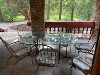 Side porch, beside hot tub, great for social time!