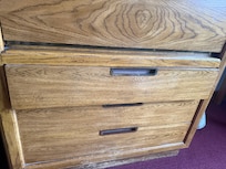 Broken drawer. Was about to fall on my kid's foot. I stopped it. Thank God.