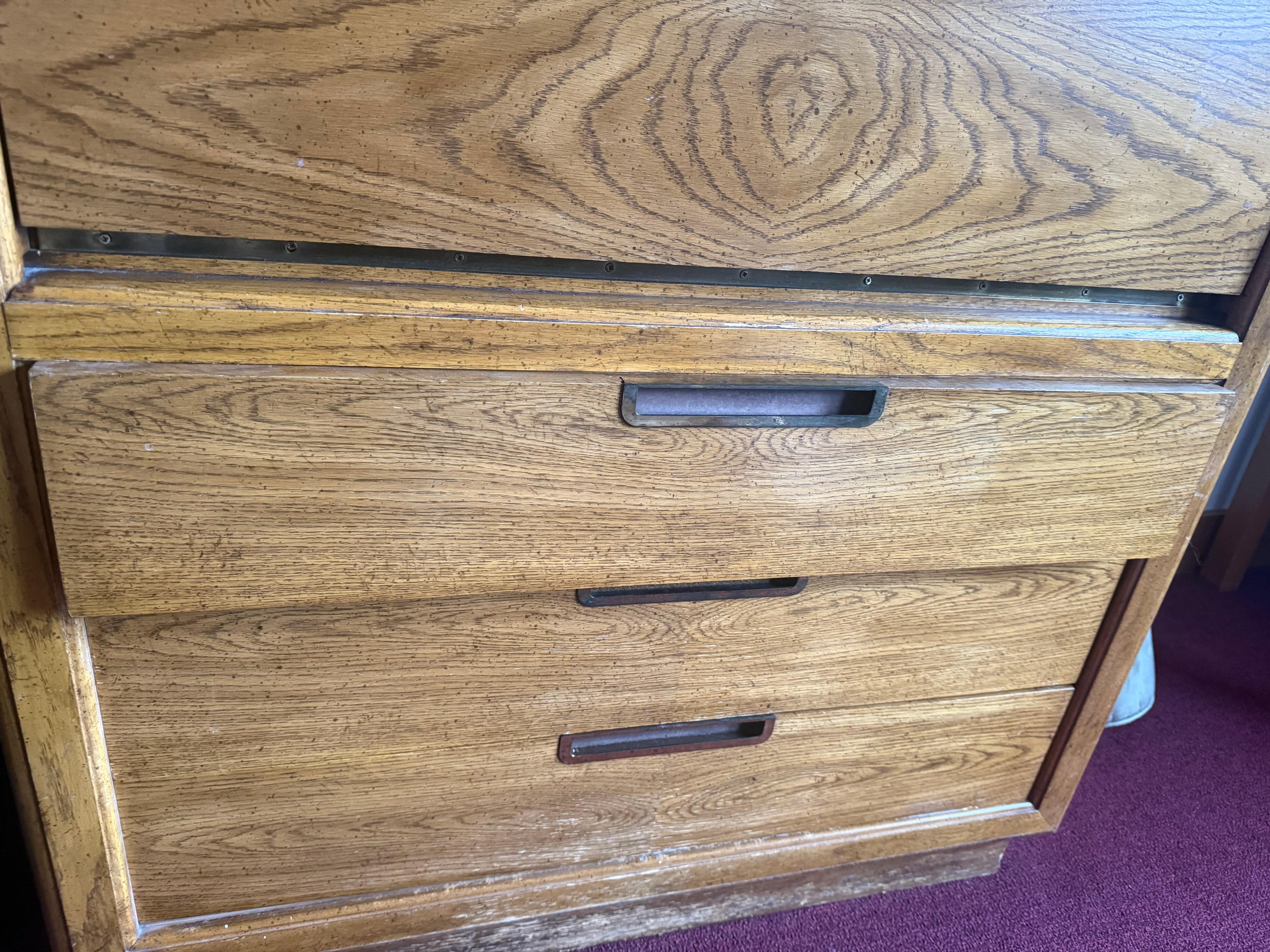 Broken drawer. Was about to fall on my kid's foot. I stopped it. Thank God. 