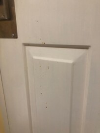 Coke or some other kind of dirt on back of door