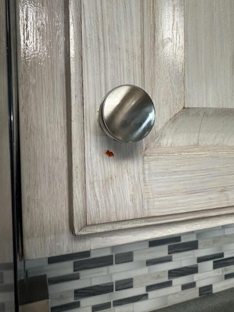 Food stuck on cabinet