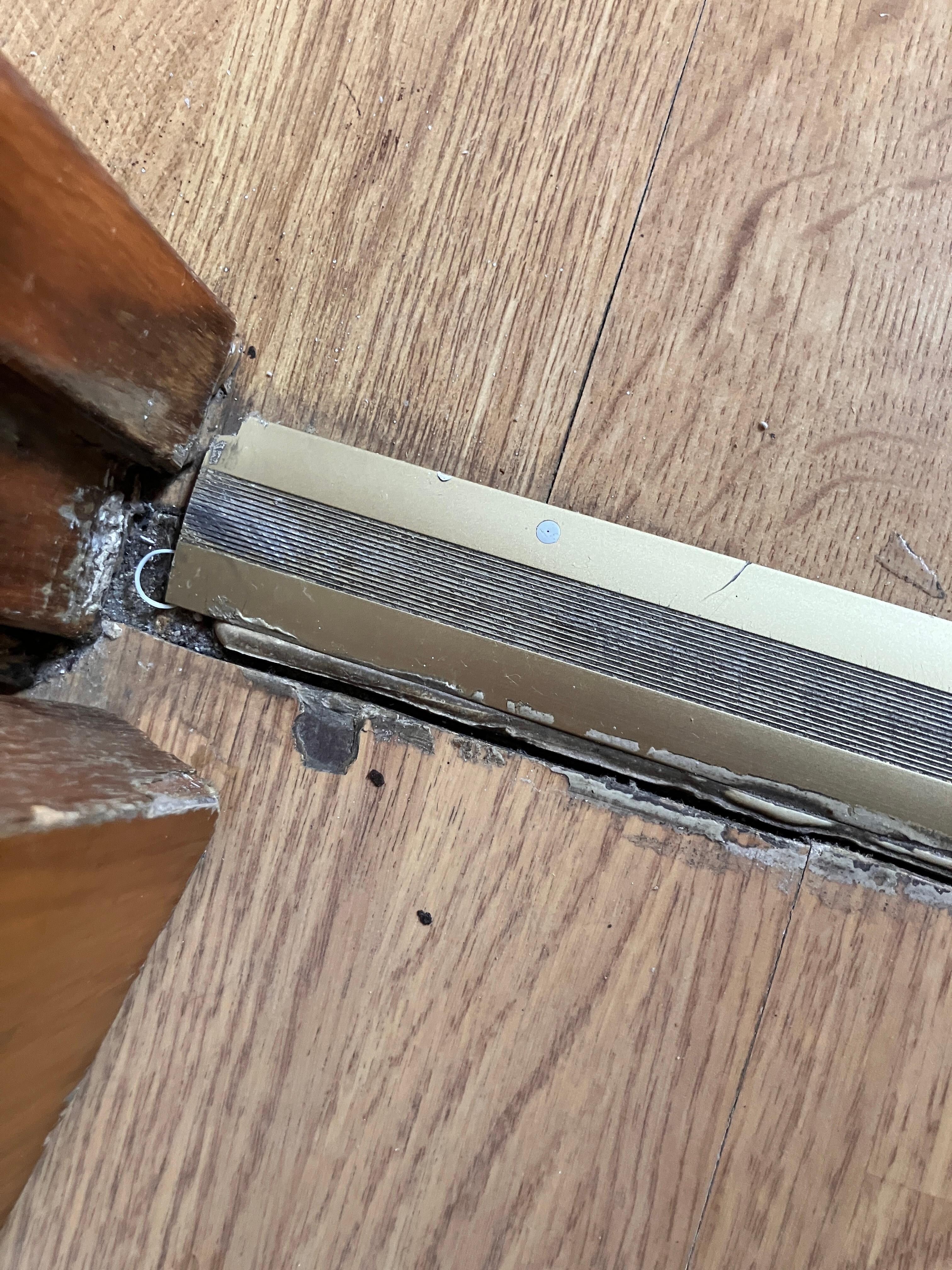 The loose threshold between the bathroom and bedroom