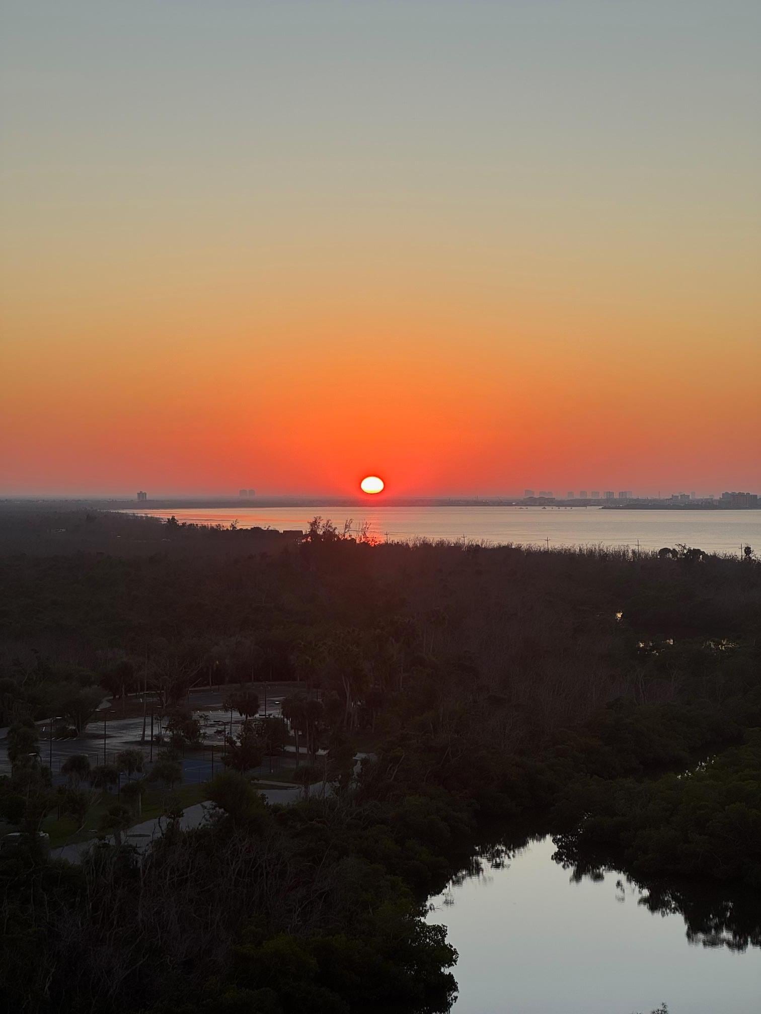 Sunrise from entryway balcony.