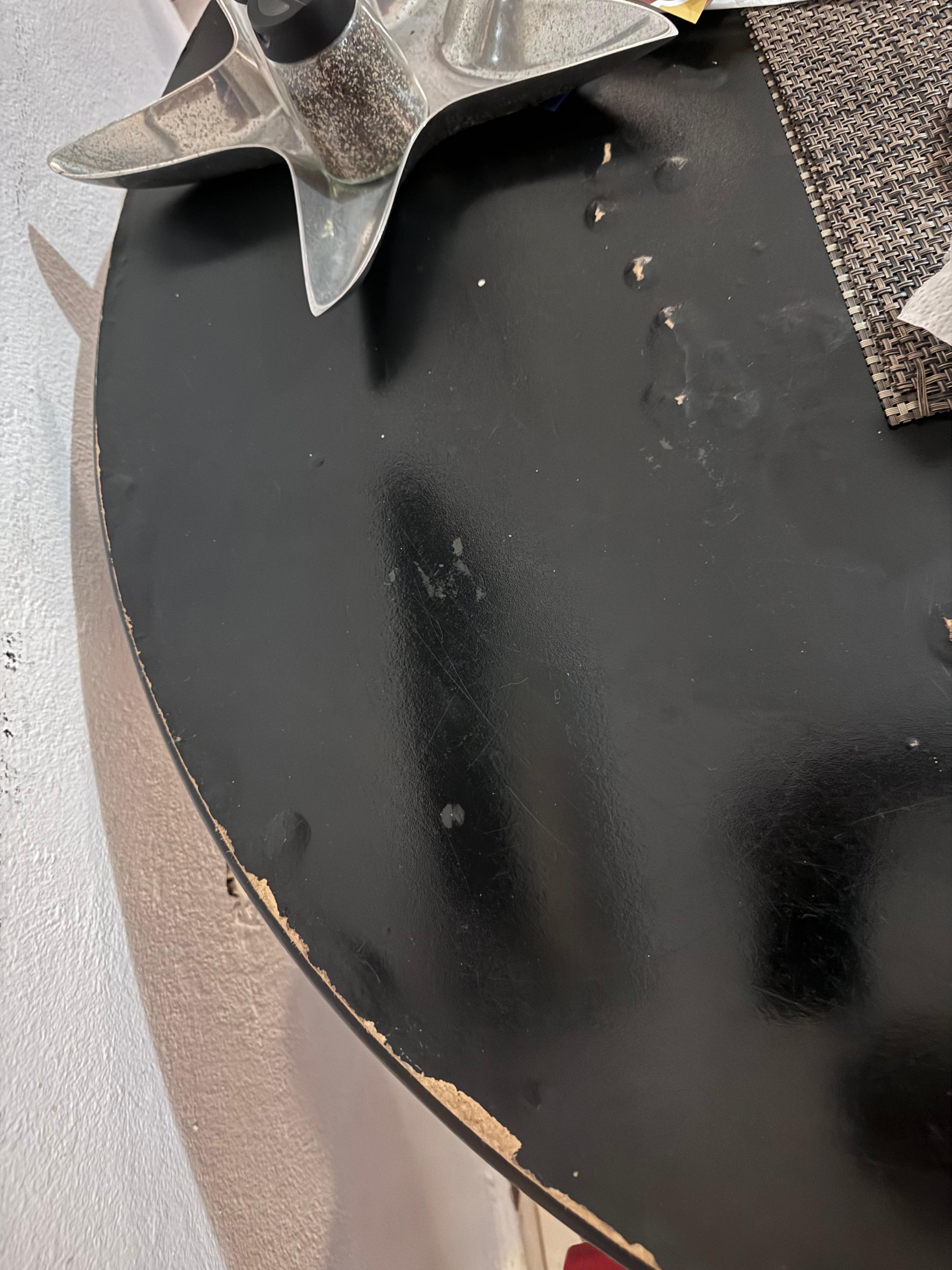 Table shows wear, bubbles