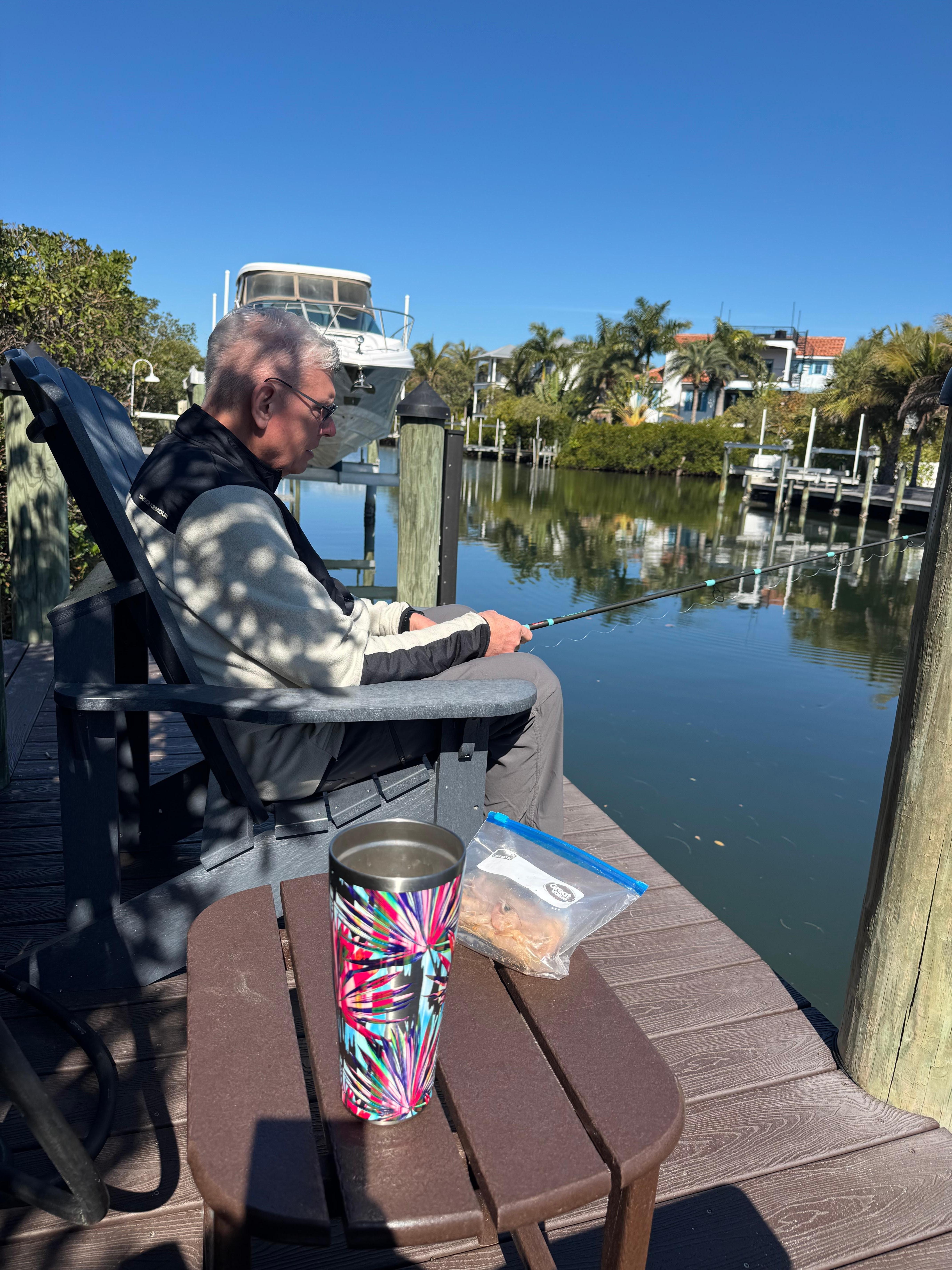 Sitting by the canal in the backyard