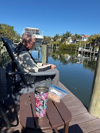 Sitting by the canal in the backyard
