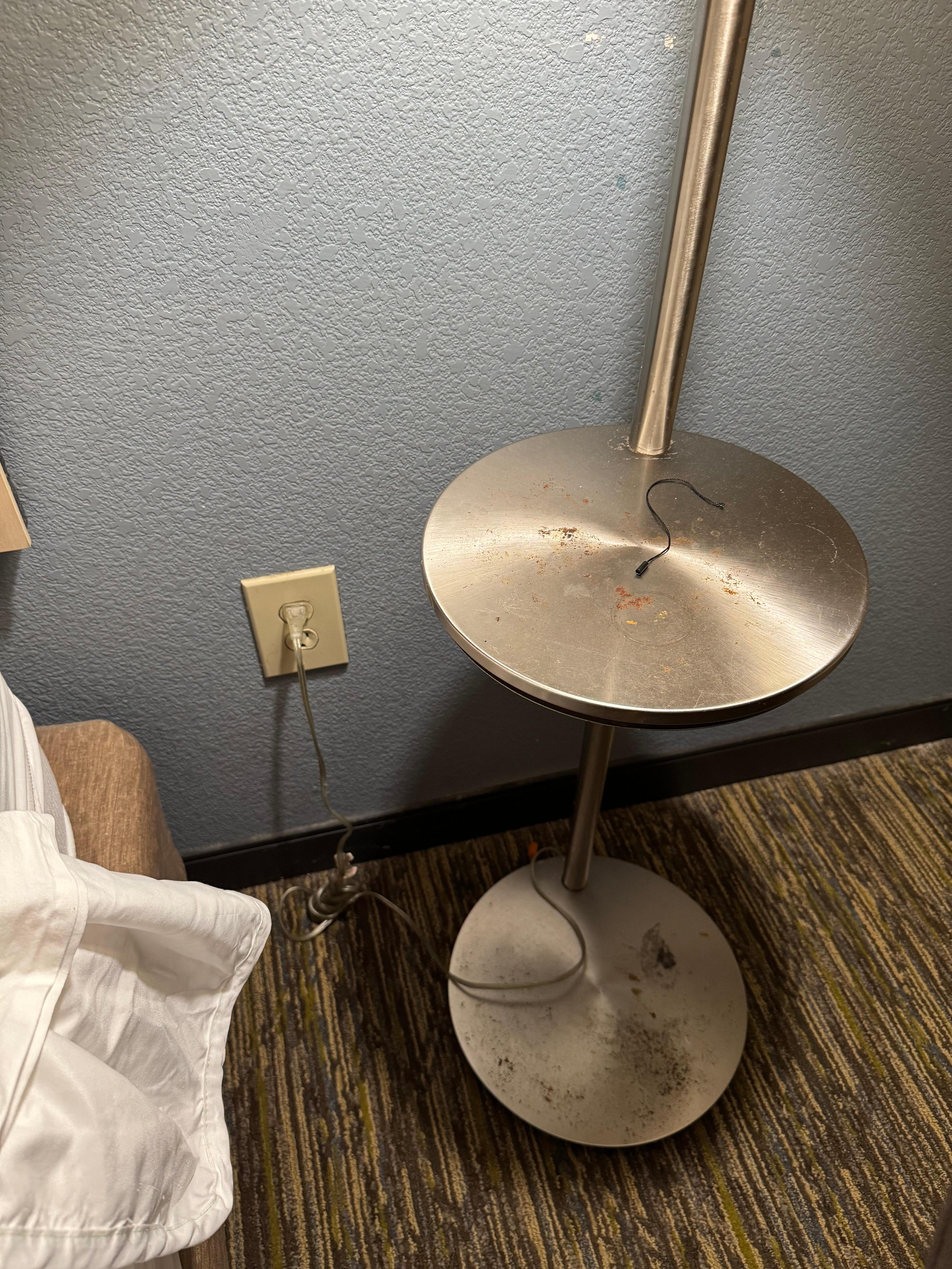 Leftover trash and dirty bedside table