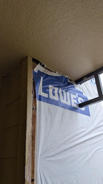 the unit is covered in construction debris