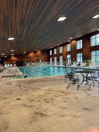 Indoor pool, with sauna at the far wnd