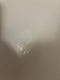 Someone’s used soap stuck to the tub.