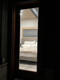 Looking into glass door from patio. No blind.