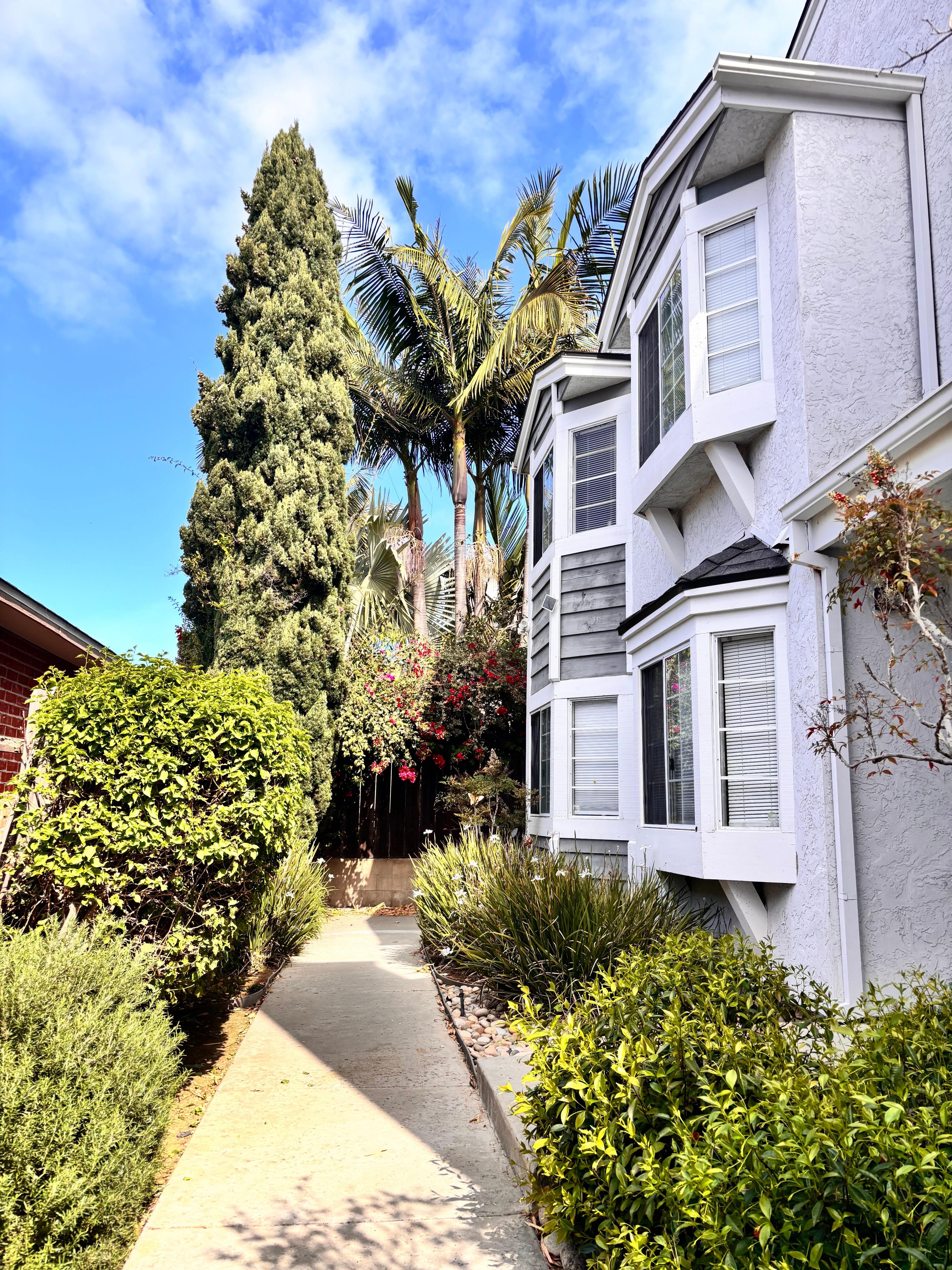 Private walkway up to property closed off with a gate. 
