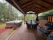 Hot tub and covered deck out the back