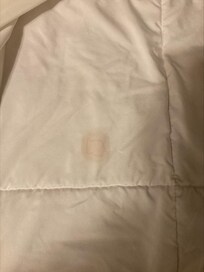 red stain on sheets