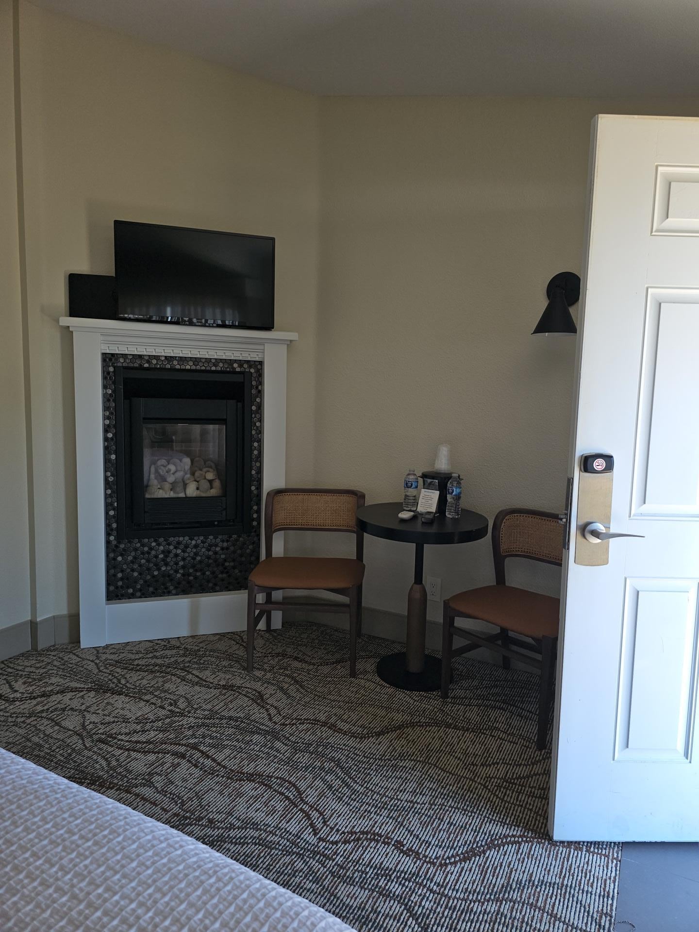 Cute sitting area with complimentary water bottles.