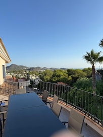 View from top floor balcony looking towards the sea
