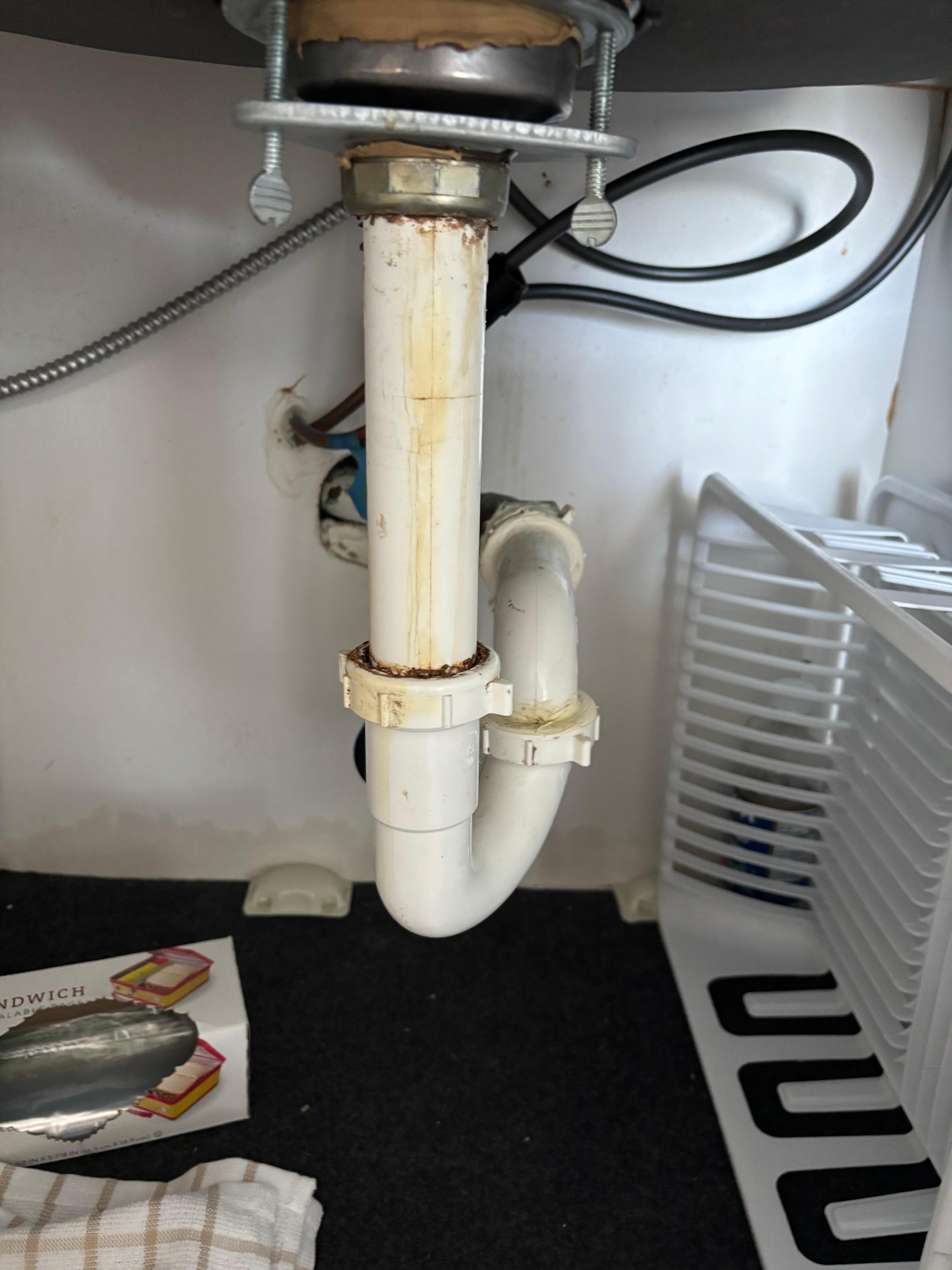 Under the kitchen sink. Water line on the bottom?
