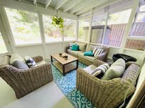 Backyard screened in area! Look for the turtle in the water fountain!