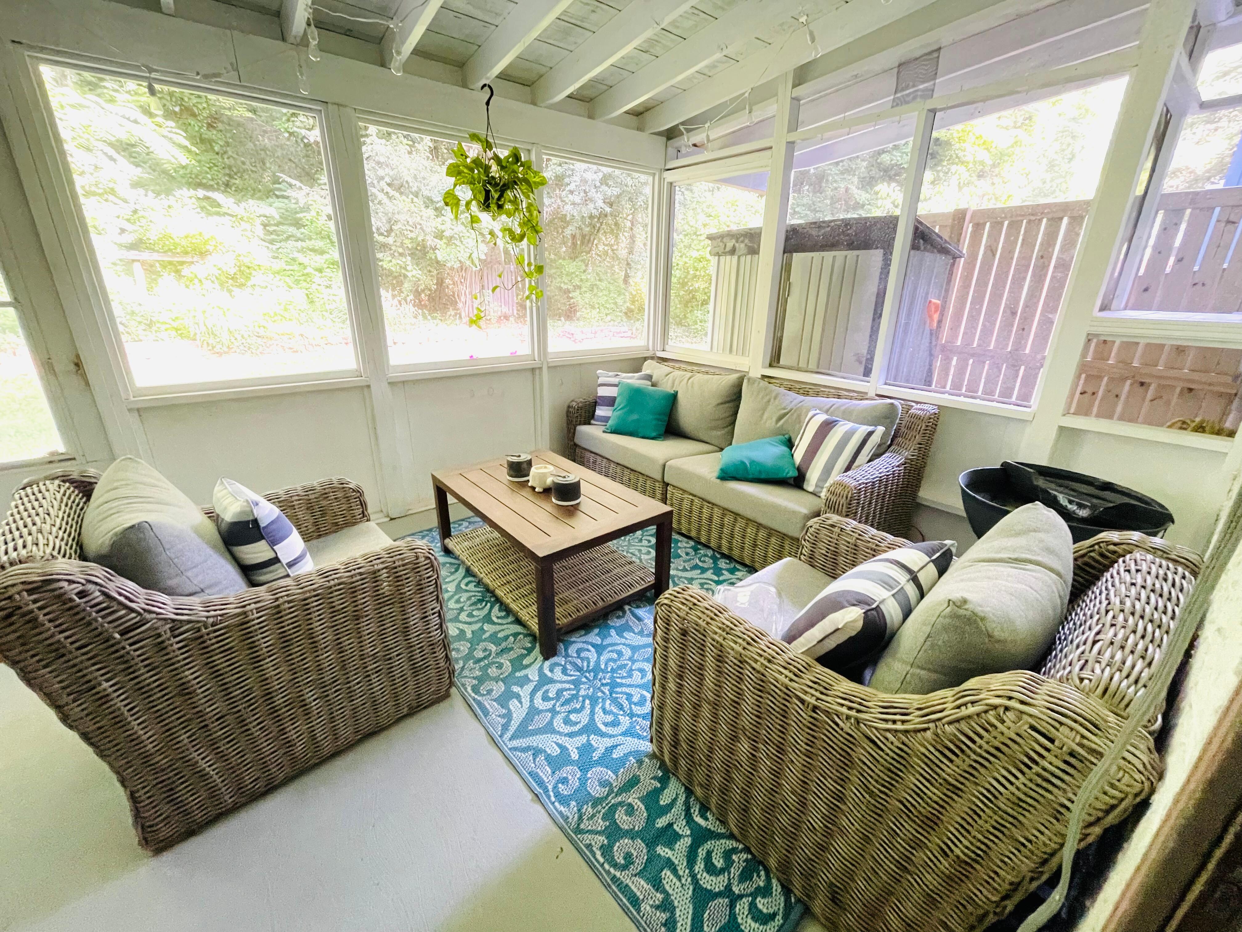 Backyard screened in area! Look for the turtle in the water fountain!