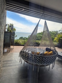 Ocean Suite balcony hanging chair.
