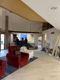 lobby and check in front desk. The lobby is very dusty and a lot of renovation tools
