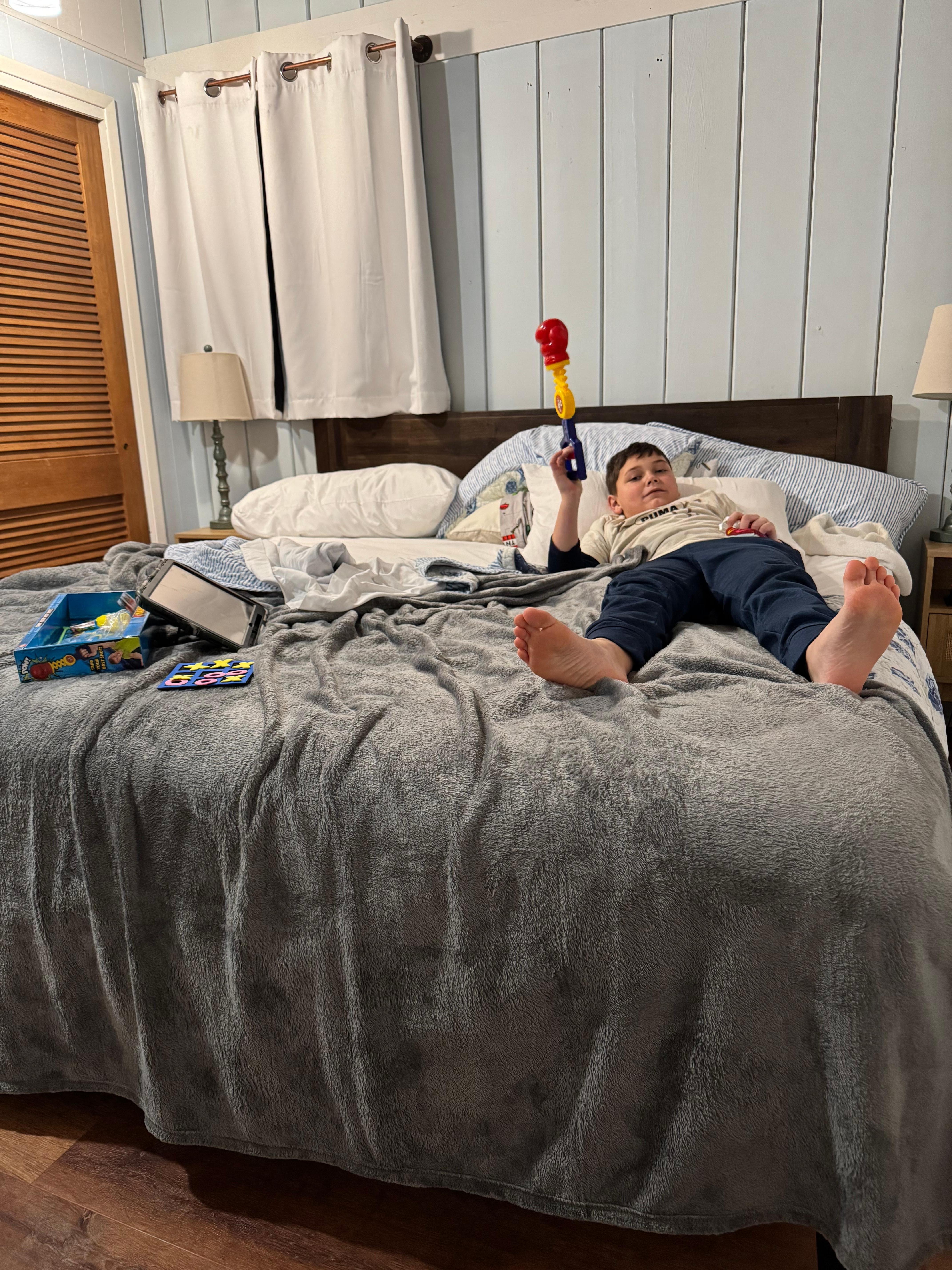 Grandson relaxing, waiting for dinner. 