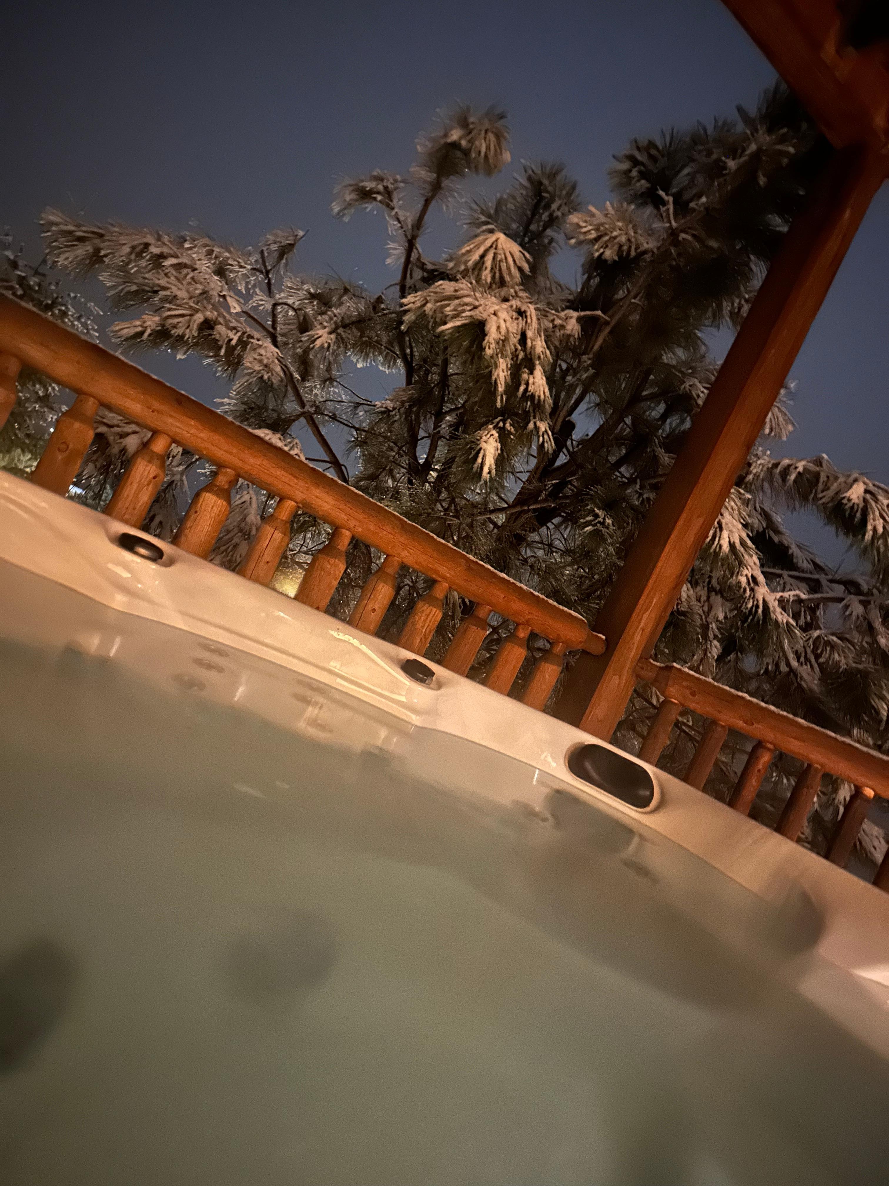 Snowing views from hot tub 