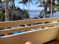 View from the ‘ocean view king bed room.’ Over looks the adult pool side.